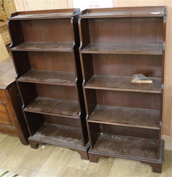 A pair of mahogany waterfall bookcases, W.56cm